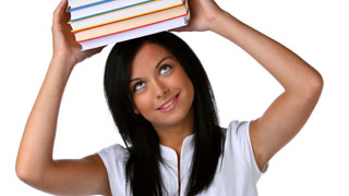 woman holding books above her head
