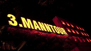 Yellow neon sign for the Third Man Tour
