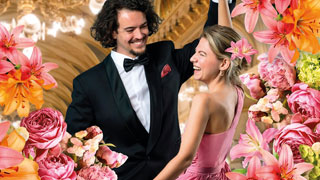 A dancing couple surrounded by flower decorations