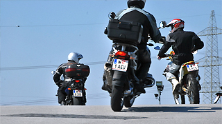 Drei Motorradfahrer