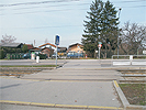 Kreuzungsbereich Neilreichgasse - Straenbahn: Breite Kreuzung mit Verkehrsinseln und Straenbahnschienen