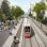 Visualisierung der Straßenbahn in der Haltestelle Vorgartenstraße, daneben Bäume und Altbauten