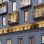 Fassade eines sanierten Gebäudes mit Dachgeschoßausbau.