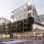 Rendering Wohngebäude an Straßenecke mit Geschäft im Erdgeschoß