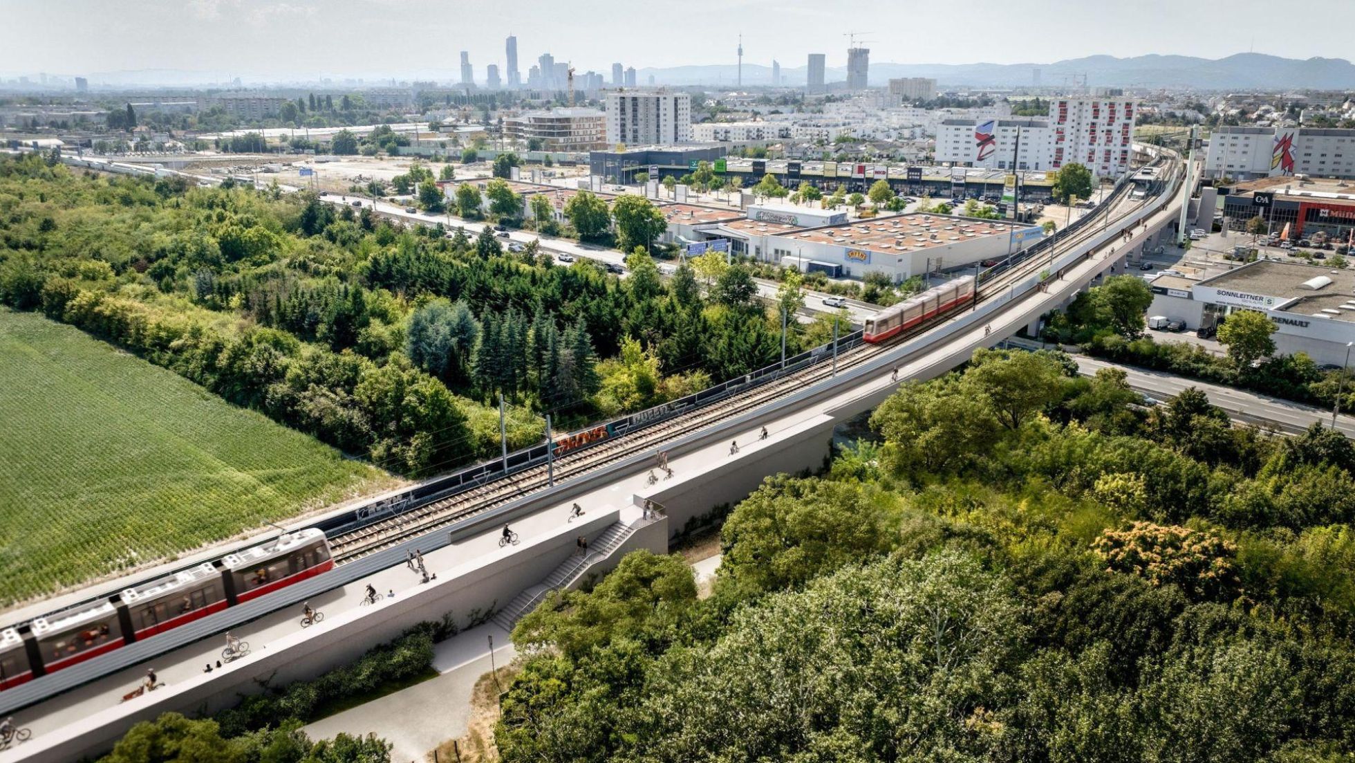 copyright: ZOOM VP U-Bahnbrücke, Wald und Felder neben dichtem Stadtgebiet