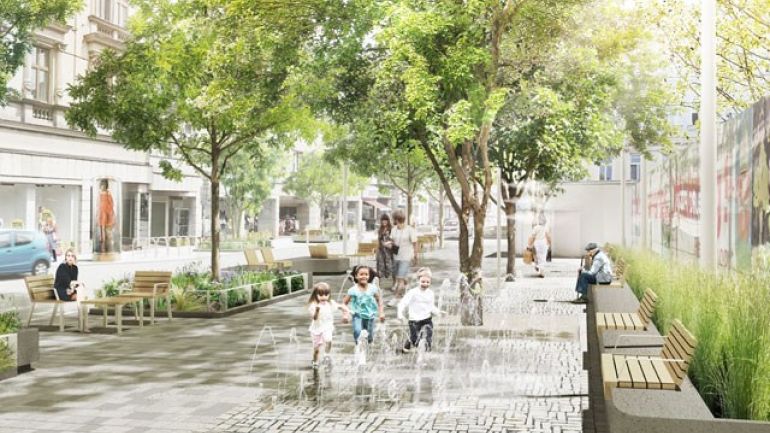 copyright: DnD Landschaftsarchitektur Platz mit Sitzgelegenheiten, Wasserspielmöglichkeit und Bäumen