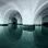 copyright: Vienna Water - Novotny Underground water reservoir with white vaulted arches reflected in still water.