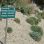 copyright: Wiener Stadtgärten Steppenlandschaft mit Schild im Vordergrund