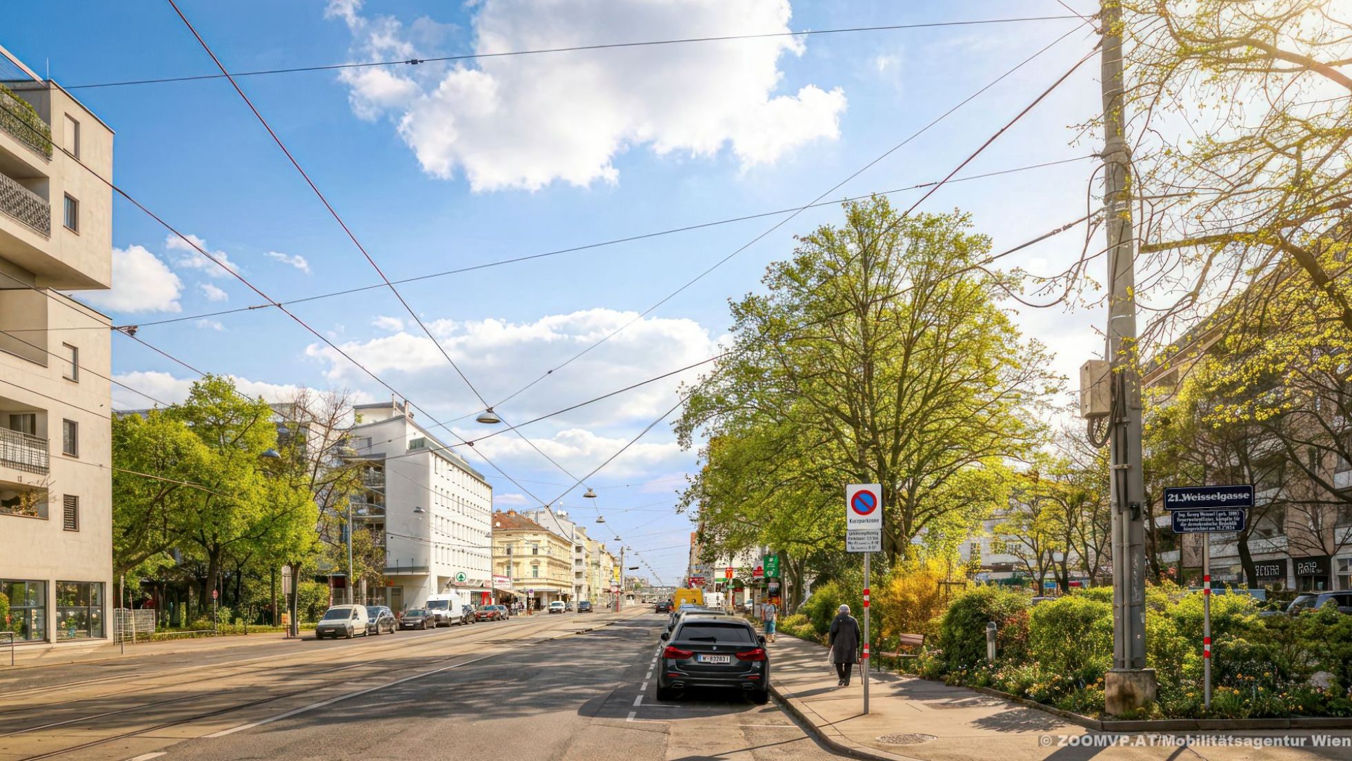 copyright: Mobilitätsagentur Wien / ZOOM.VP Visualisierung zeigt Straße mit Parkplätzen und daneben Wohngebäude, Bäume und ein begrünter Zaun