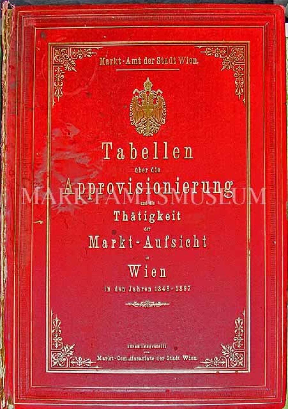 Roter Buchumschlag mit der Aufschrift "Tabellen über die Approvisionierung und die Thätigkeit der Markt-Aufsicht in Wien in den Jahren 1848-1897"