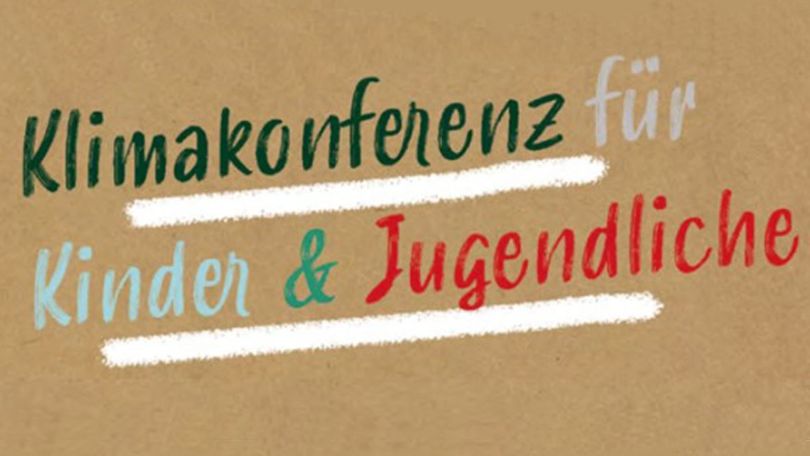 Bunter Schriftzug auf braunem Hintergrund