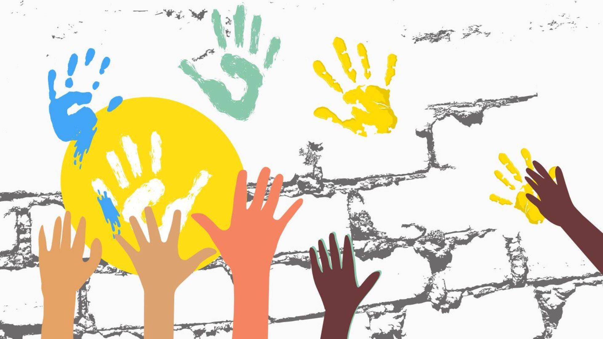 Verschiedene Hände hinterlassen bunte Handabdrücke.