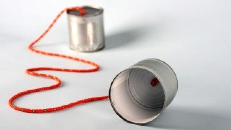 copyright: BilderBox.com Mit Schnur verbundene Dosen