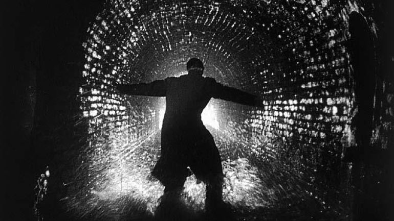 Harry Lime fleeing through Vienna’s sewers