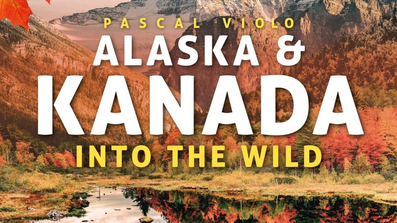 copyright: Pascal Violo Flyer der Veranstaltung "Alaska und Kanada Into the wild" mit einer kanadischen Landschaft und einem Elch