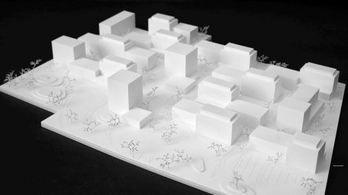 Modell in weiß mit Quader als Darstellung für Gebäude