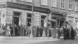people waiting in front of a store