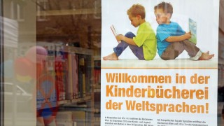 Poster advertising the childrens library for world languages