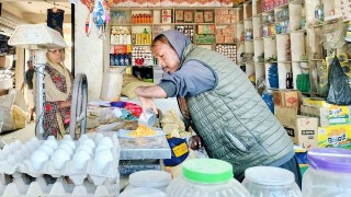 Man with a disability works in a store