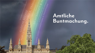 Regenbogen hinter dem Wiener Rathaus, daneben Schriftzug "Amtliche Buntmachung"