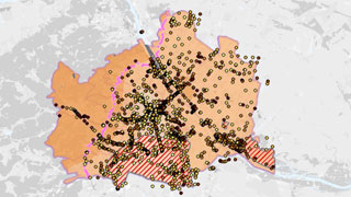 Stadtplanausschnitt mit bunten Flchen, die die mittlere Wrmeleitfhigkeit mit Bohrprofilen anzeigen